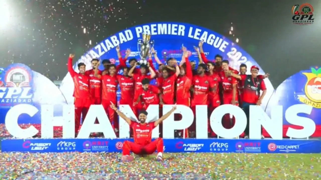 Migsun Champions lift the Ghaziabad Premier League 2026 trophy amid confetti